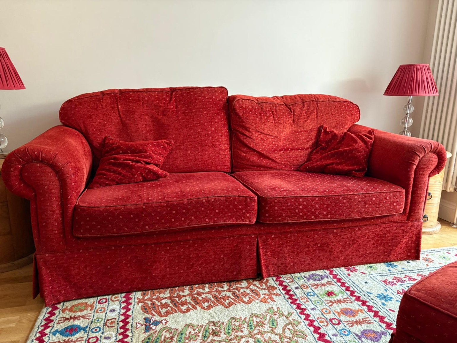 Cutting the sofa in to 2 pieces, then re-upholstering